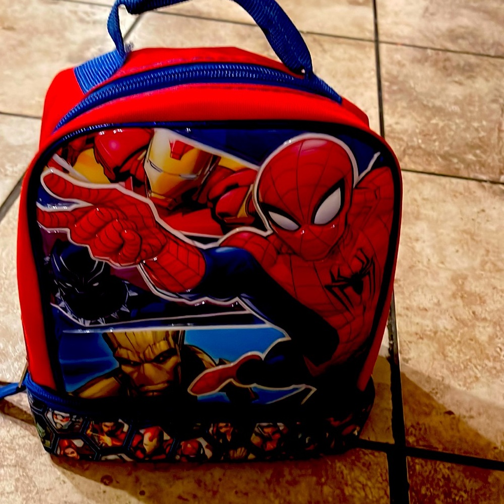 Spider-Man and  Superheroes theme hand carried . 8”wide x 9” high